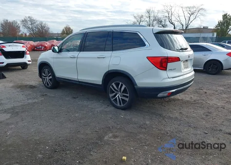 2017 Honda Pilot Elite z USA, uszkodzony, nr VIN 5FNYF6H04HB022847
